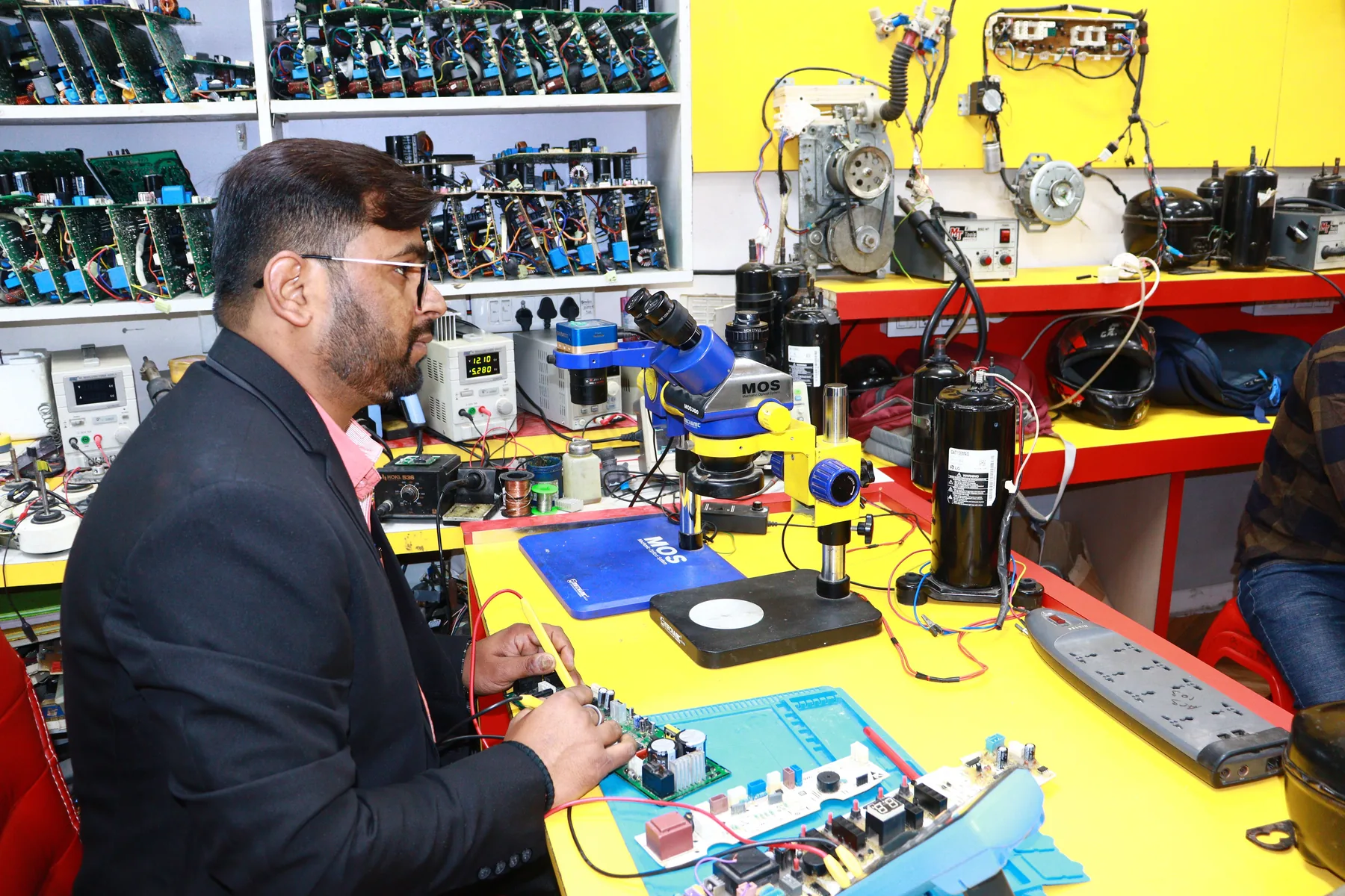 Representative electronics and AC service workshop